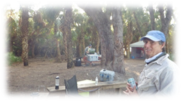 A person standing in front of a table

Description automatically generated