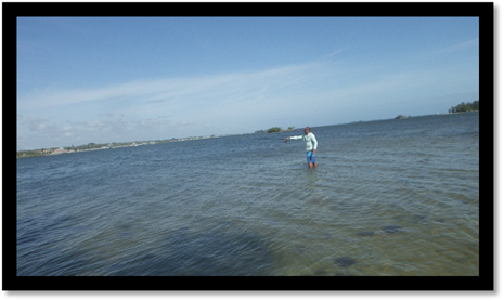A person standing in water

Description automatically generated